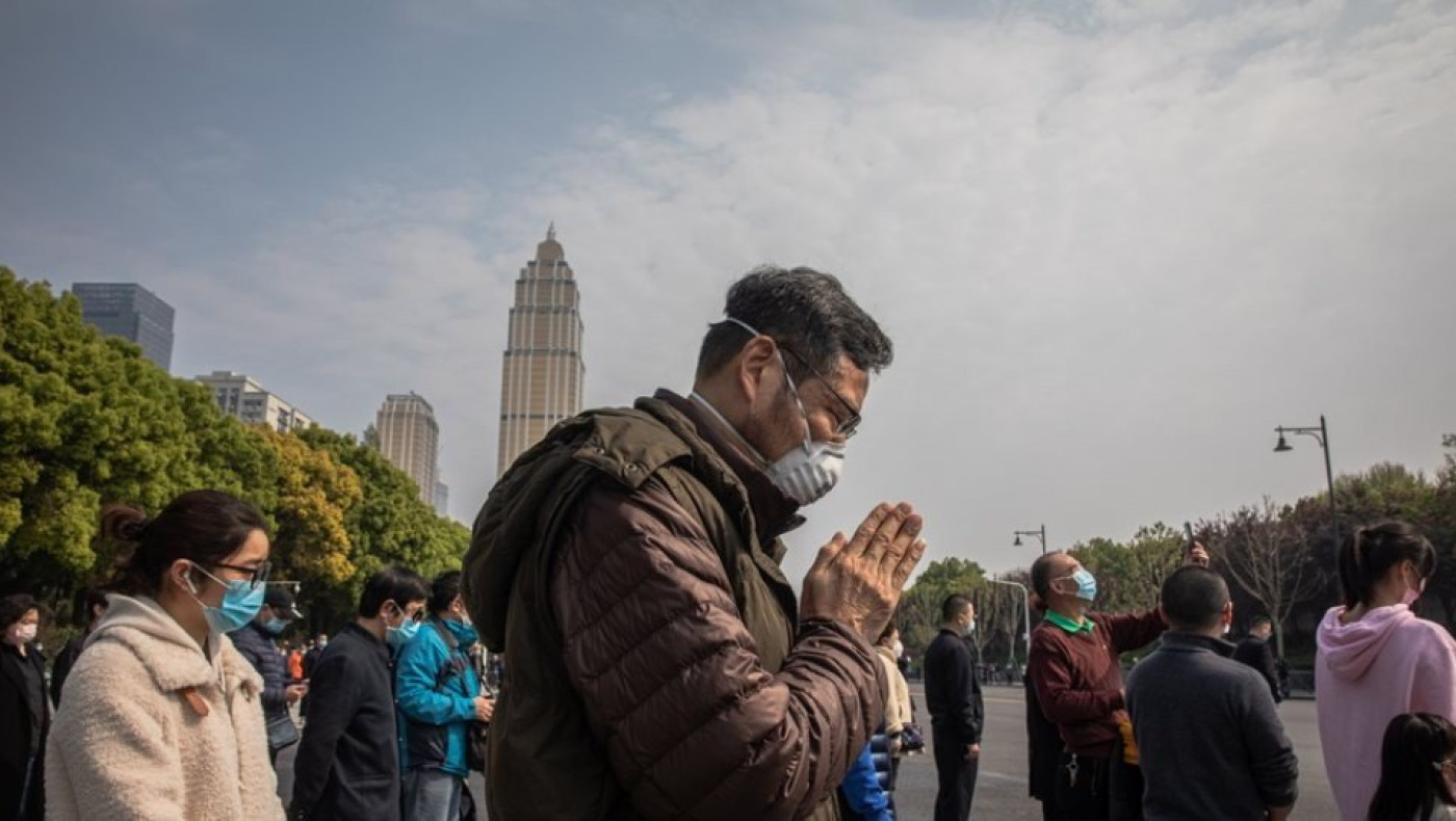 Τρία λεπτά σιγής για τους νεκρούς του ιού στην Κίνα