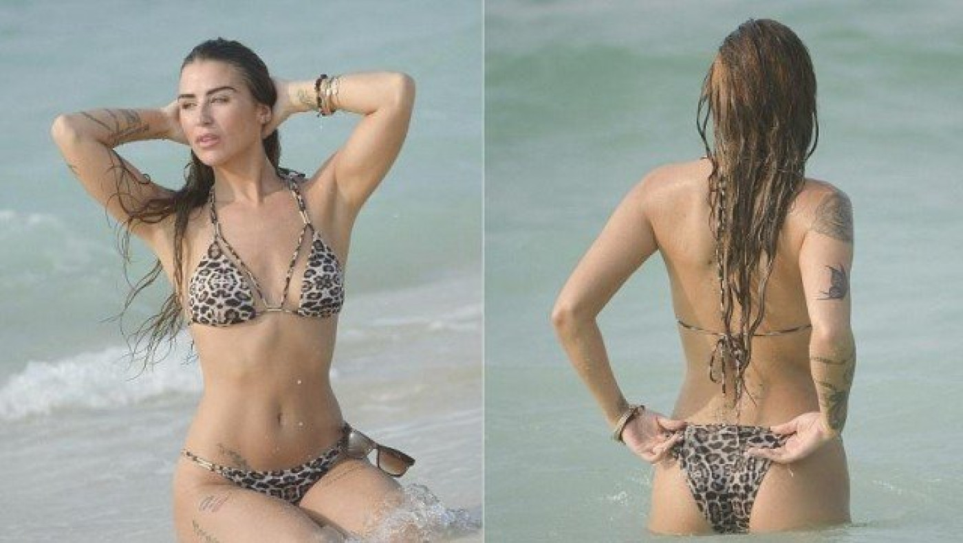 Η πρώην ερωμένη του Ρούνεϊ «δαμάζει» τα κύματα (pics)