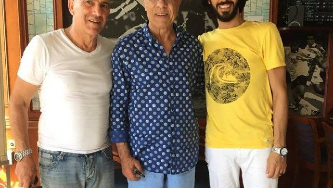 Ο Γιώργος Κούδας                  με τον Ομάρ Τολμπά